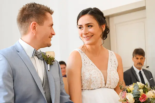 Wedding photography Munich Bridal couple looking forward to each other Wedding photography Munich Bridal couple looking forward to each other